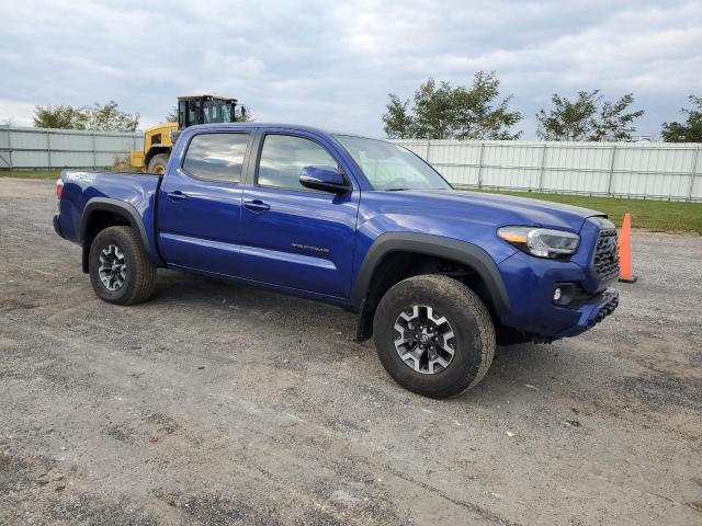 3TMCZ5AN7NM514264 - 2022 TOYOTA TACOMA DOUBLE CAB BLUE photo 4