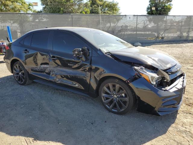 JTDP4MCE8P3515662 - 2023 TOYOTA COROLLA SE Schwarz Foto 4