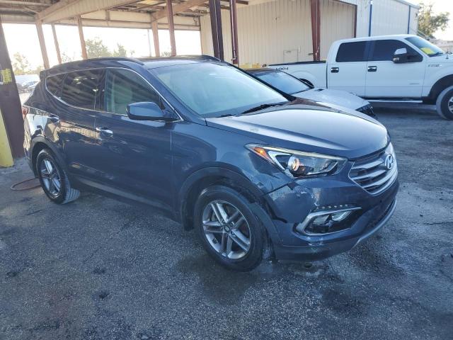 5NMZU3LBXHH037188 - 2017 HYUNDAI SANTA FE S BLUE photo 4
