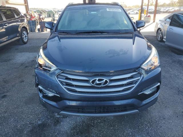 5NMZU3LBXHH037188 - 2017 HYUNDAI SANTA FE S BLUE photo 5