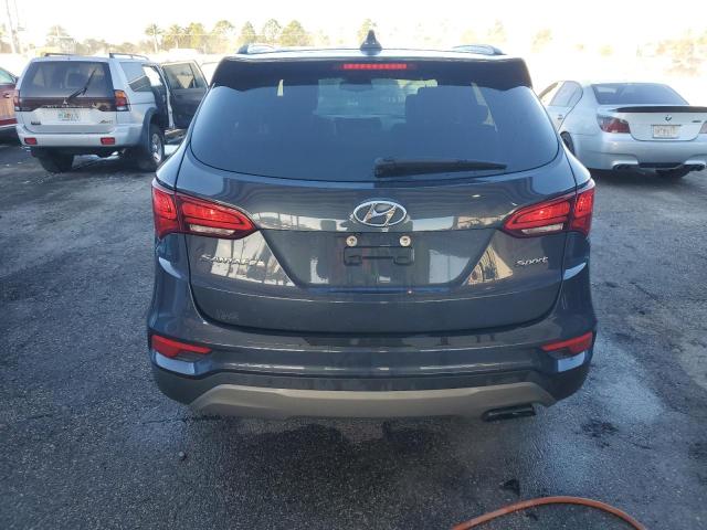 5NMZU3LBXHH037188 - 2017 HYUNDAI SANTA FE S BLUE photo 6
