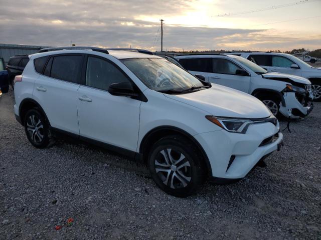 JTMBFREV0HD200297 - 2017 TOYOTA RAV4 LE WHITE photo 4