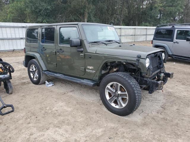 1C4BJWEG0FL696686 - 2015 JEEP WRANGLER U SAHARA GREEN photo 4