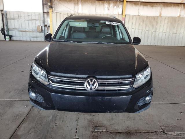 WVGAV7AX8CW522446 - 2012 VOLKSWAGEN TIGUAN S BLACK photo 5