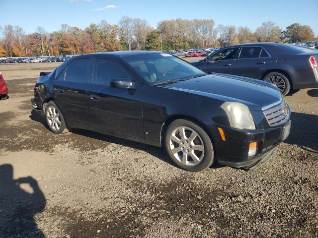 1G6DP577160118423 - 2006 CADILLAC CTS HI FEATURE V6 BLACK photo 4