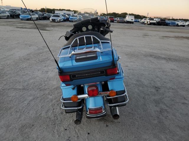 1HD1FC412BB660652 - 2011 HARLEY-DAVIDSON FLHTCU Blau Foto 4