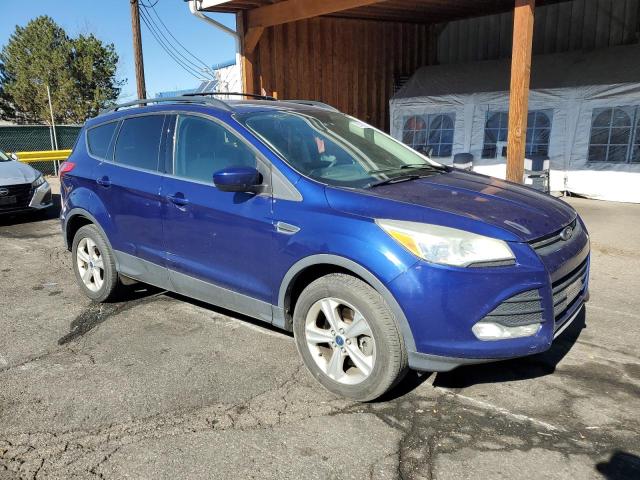 1FMCU9G96EUA77185 - 2014 FORD ESCAPE SE BLUE photo 4