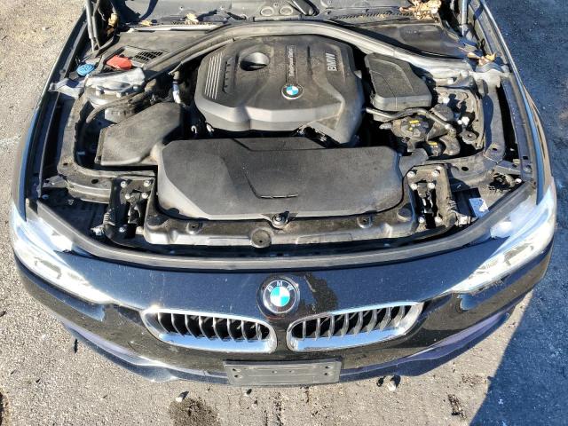 WBA8D9C51JEM31788 - 2018 BMW 330 XI BLACK photo 11