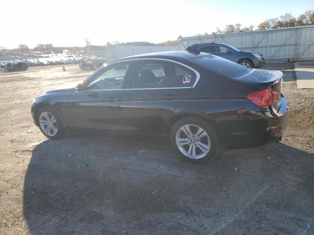 WBA8D9C51JEM31788 - 2018 BMW 330 XI BLACK photo 2