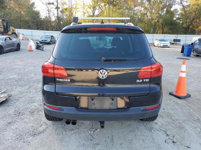 WVGAV7AX0CW557370 - 2012 VOLKSWAGEN TIGUAN S BLACK photo 6