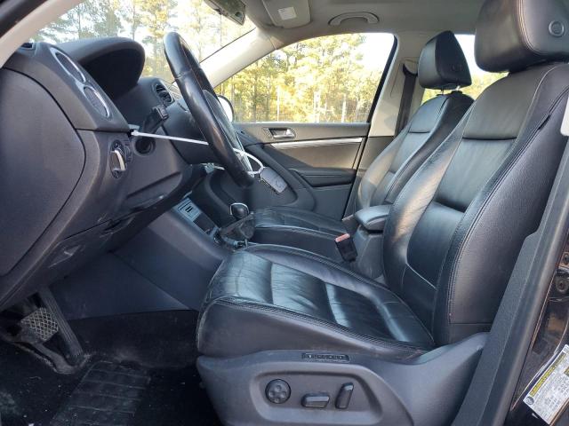 WVGAV7AX0CW557370 - 2012 VOLKSWAGEN TIGUAN S BLACK photo 7
