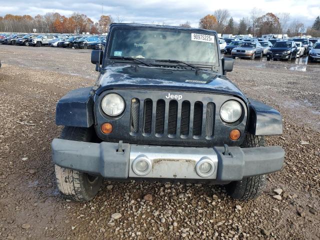 1J4FA541X9L756724 - 2009 JEEP WRANGLER SAHARA შავი ფოტო 5