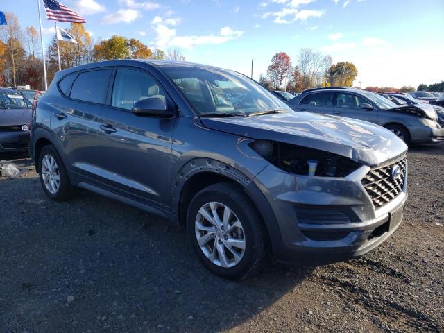 KM8J2CA48KU924467 - 2019 HYUNDAI TUCSON SE Grau Foto 4