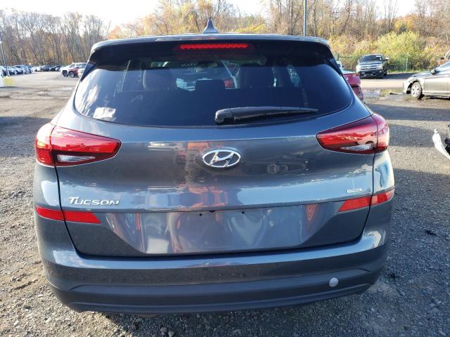 KM8J2CA48KU924467 - 2019 HYUNDAI TUCSON SE Grau Foto 6