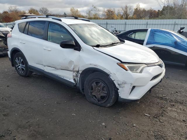 2T3BFREV8GW414522 - 2016 TOYOTA RAV4 LE WHITE photo 4