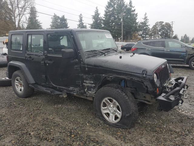 1J4BA3H14AL193039 - 2010 JEEP WRANGLER U SPORT Schwarz Foto 4