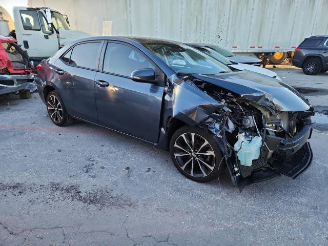 5YFBURHE9JP809392 - 2018 TOYOTA COROLLA L BLUE photo 4