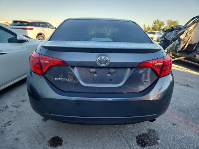 5YFBURHE9JP809392 - 2018 TOYOTA COROLLA L BLUE photo 6