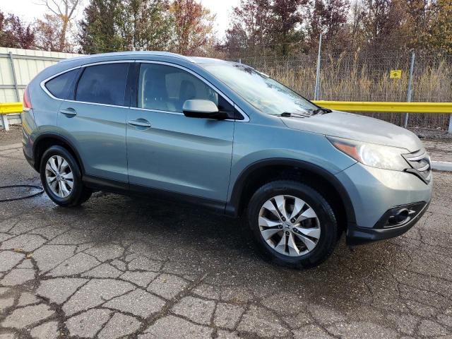 JHLRM4H70CC022090 - 2012 HONDA CR-V EXL TURQUOISE photo 4