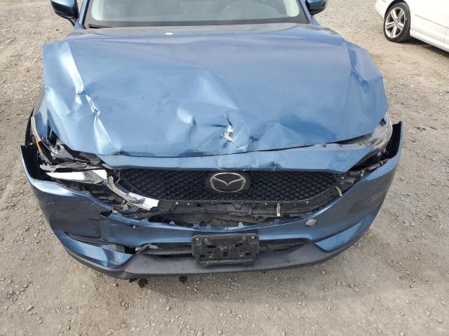 JM3KFABM1M0384963 - 2021 MAZDA CX-5 SPORT BLUE photo 12