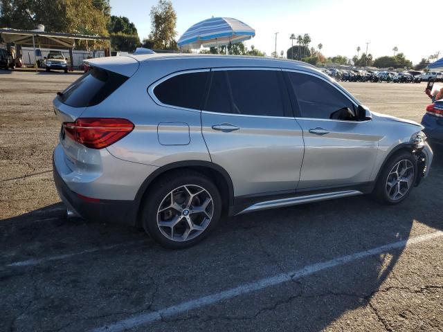 WBXHU7C57K3H46119 - 2019 BMW X1 SDRIVE28I SILVER photo 3