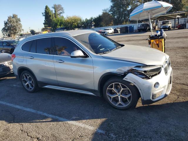 WBXHU7C57K3H46119 - 2019 BMW X1 SDRIVE28I SILVER photo 4