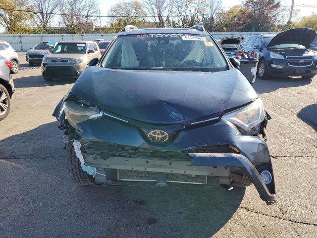 JTMRFREV5HJ704392 - 2017 TOYOTA RAV4 XLE BLUE photo 5