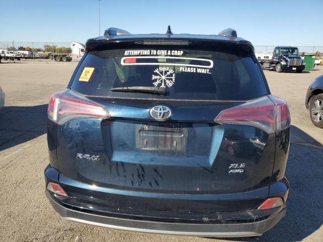 JTMRFREV5HJ704392 - 2017 TOYOTA RAV4 XLE BLUE photo 6
