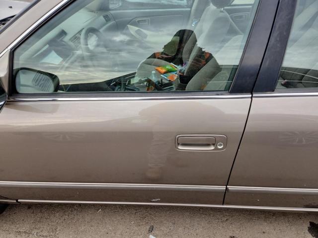 JT2BF22K9X0224646 - 1999 TOYOTA CAMRY LE TAN photo 7