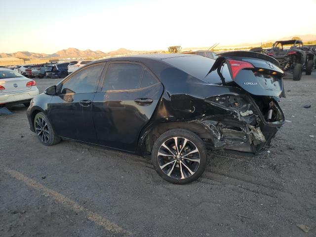 5YFBURHE9KP890329 - 2019 TOYOTA COROLLA L BLACK photo 2