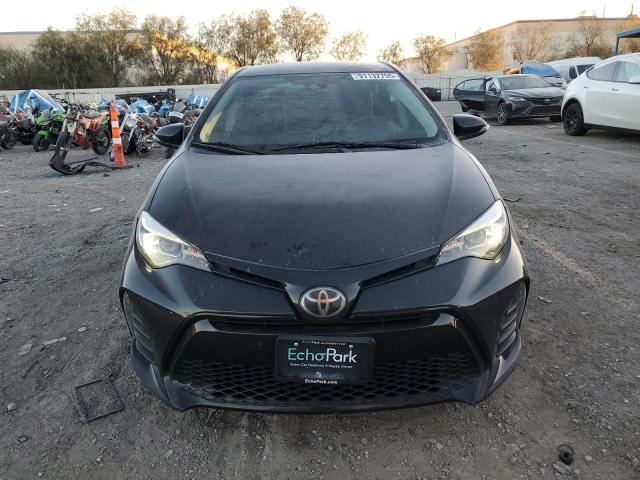 5YFBURHE9KP890329 - 2019 TOYOTA COROLLA L BLACK photo 5