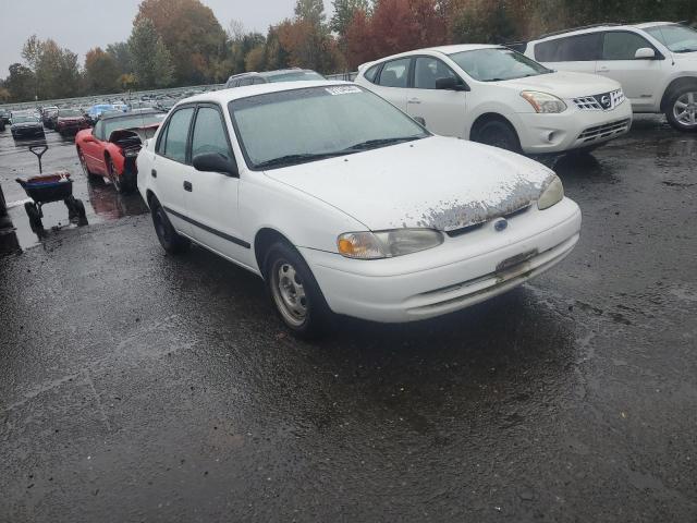 1Y1SK5483XZ408431 - 1999 CHEVROLET GEO PRIZM BASE WHITE photo 4