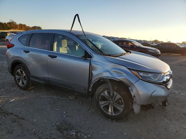 2HKRW5H36KH414035 - 2019 HONDA CR-V LX SILVER photo 4