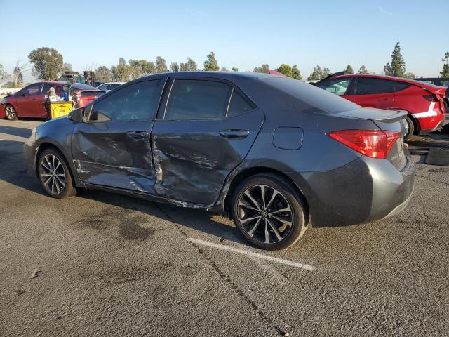 5YFBURHE1KP893631 - 2019 TOYOTA COROLLA L ნაცრისფერი ფოტო 2