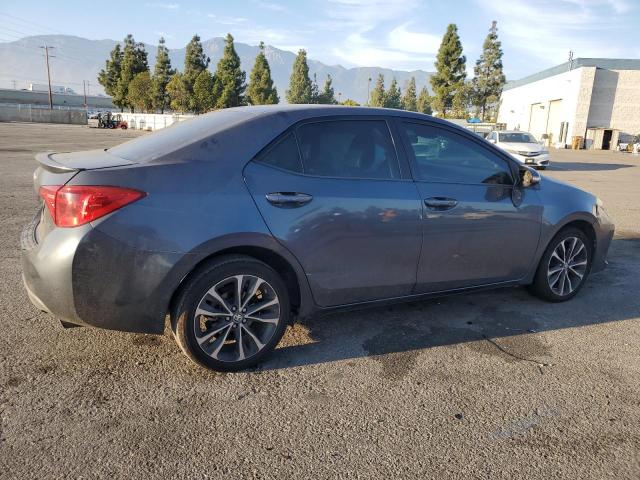 5YFBURHE1KP893631 - 2019 TOYOTA COROLLA L ნაცრისფერი ფოტო 3