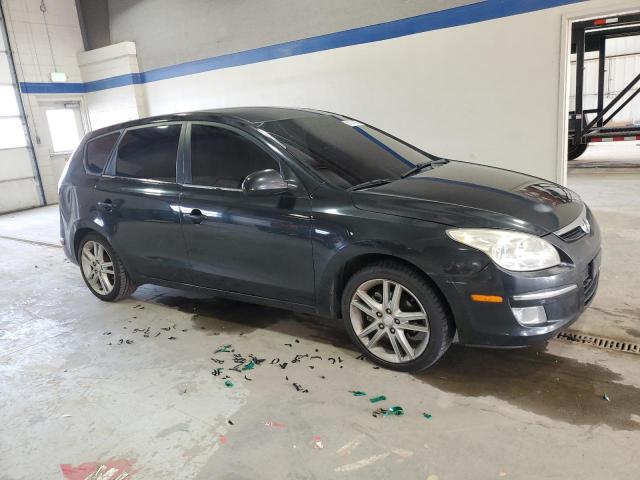 KMHDC86E09U040428 - 2009 HYUNDAI ELANTRA BLACK photo 4