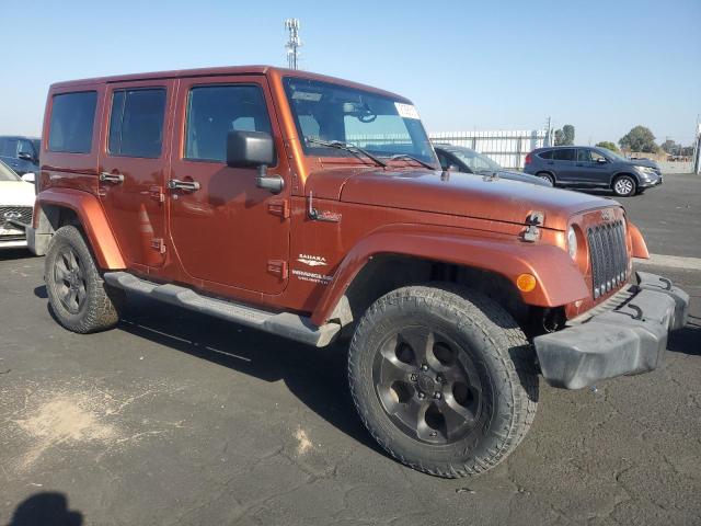 1C4BJWEG6EL258544 - 2014 JEEP WRANGLER U SAHARA ORANGE photo 4