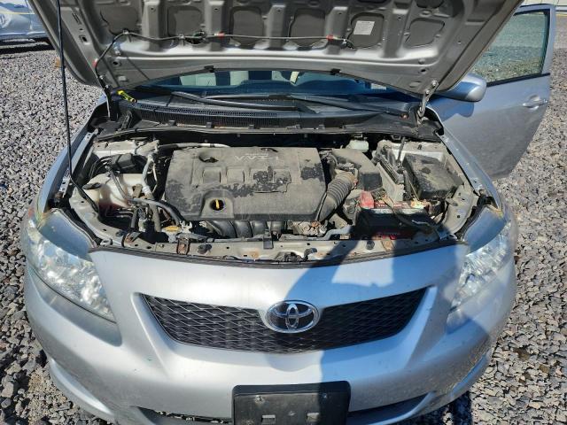 JTDBL40E499045874 - 2009 TOYOTA COROLLA BASE Silber Foto 11