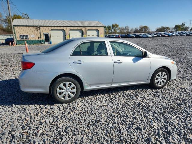 JTDBL40E499045874 - 2009 TOYOTA COROLLA BASE Silber Foto 3
