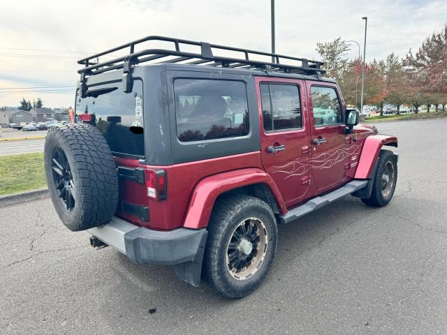 1J4BA5H17BL593450 - 2011 JEEP WRANGLER U SAHARA წითელი ფოტო 4