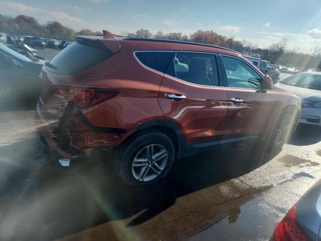 5XYZU3LB6HG460568 - 2017 HYUNDAI SANTA FE S ORANGE photo 3