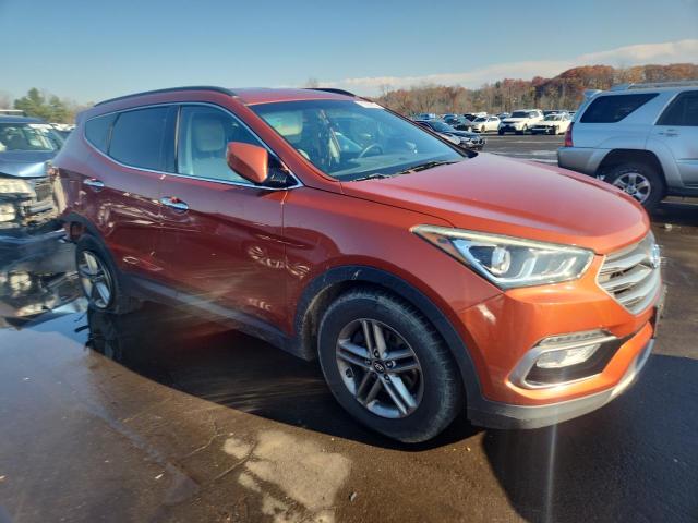 5XYZU3LB6HG460568 - 2017 HYUNDAI SANTA FE S ORANGE photo 4