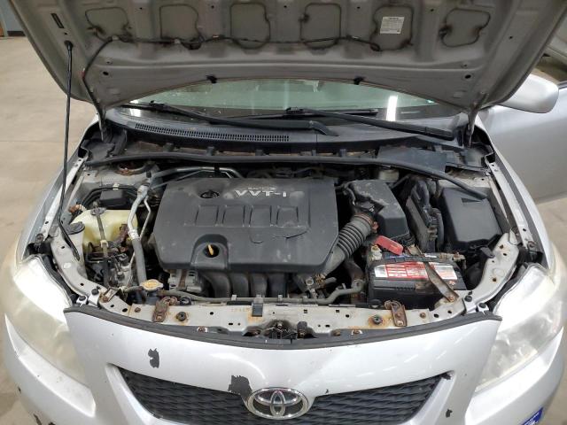 1NXBU4EEXAZ369088 - 2010 TOYOTA COROLLA BASE SILVER photo 11