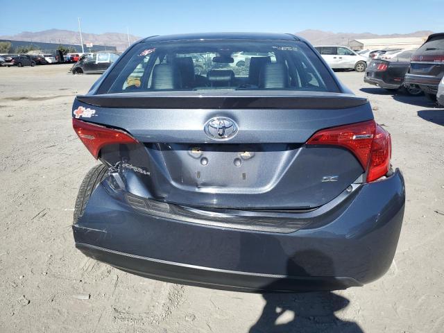 5YFBURHE4JP767858 - 2018 TOYOTA COROLLA L BLUE photo 6