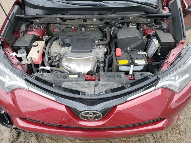 JTMBFREV4JD246673 - 2018 TOYOTA RAV4 LE Rot Foto 12