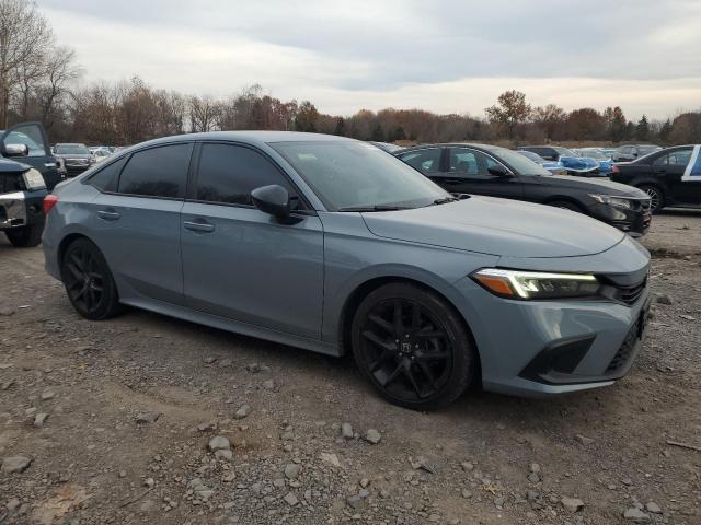 2HGFE2F50NH590358 - 2022 HONDA CIVIC SPORT BLUE photo 4