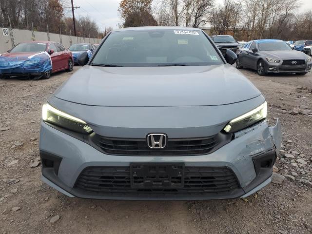 2HGFE2F50NH590358 - 2022 HONDA CIVIC SPORT BLUE photo 5