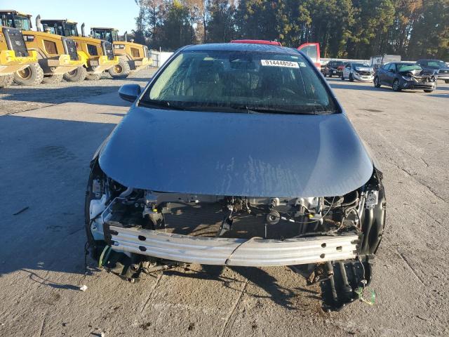 5YFB4MDE3PP032824 - 2023 TOYOTA COROLLA LE SILVER photo 5