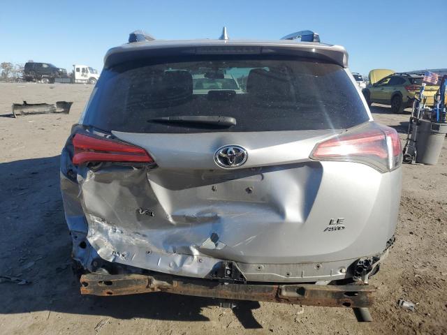 2T3BFREV6GW425034 - 2016 TOYOTA RAV4 LE SILVER photo 6
