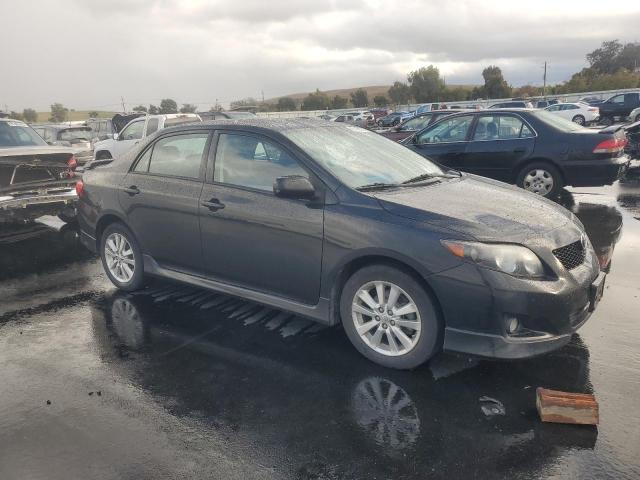 2T1BU4EE5AC433040 - 2010 TOYOTA COROLLA BASE BLACK photo 4